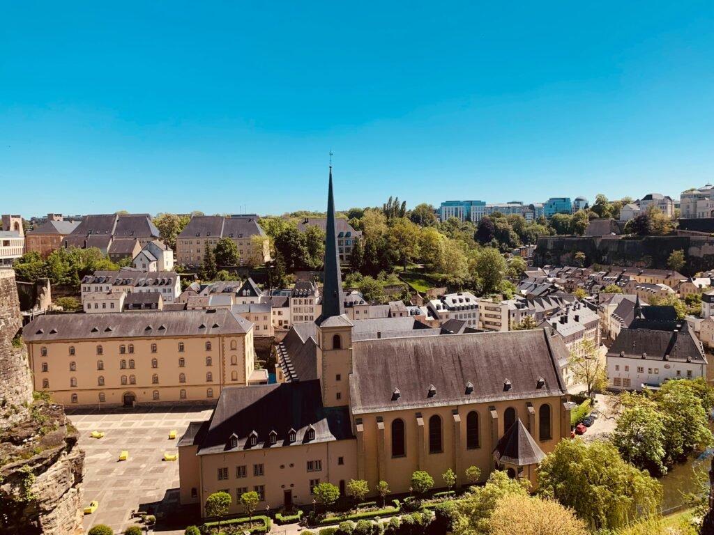 A captivating aerial shot of Luxembourg's historic old town featuring a picturesque church.