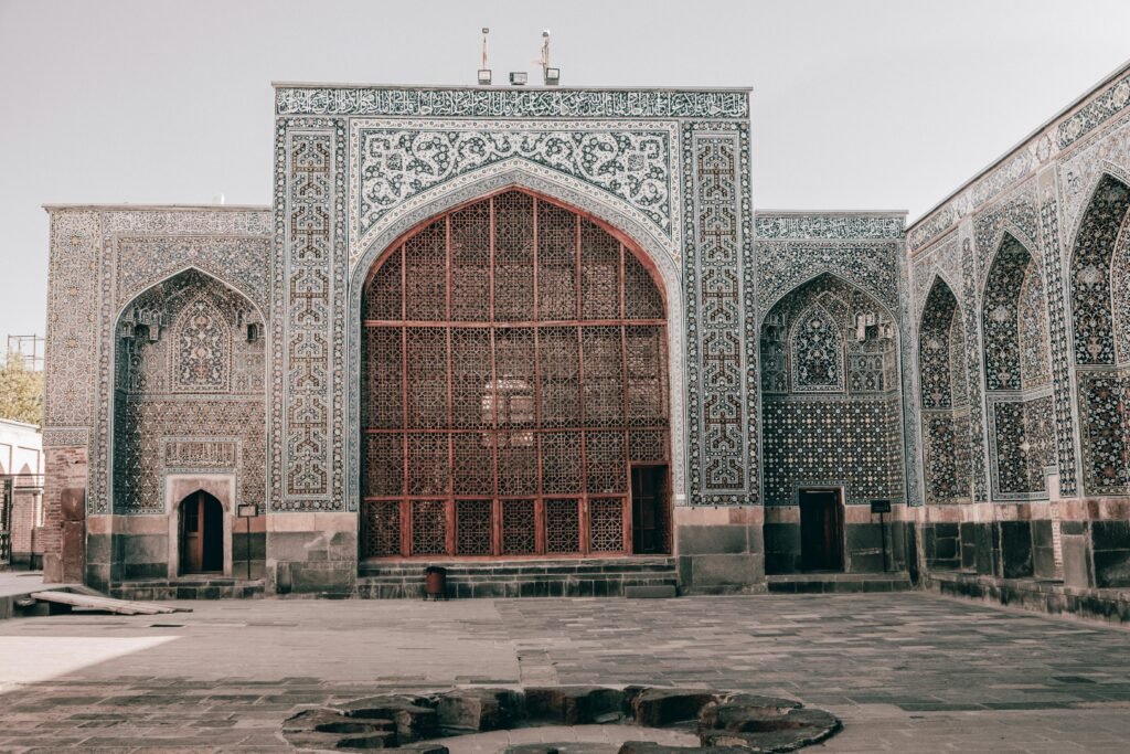 Explore the intricate details of Persian Islamic architecture in this historic Iranian landmark image.